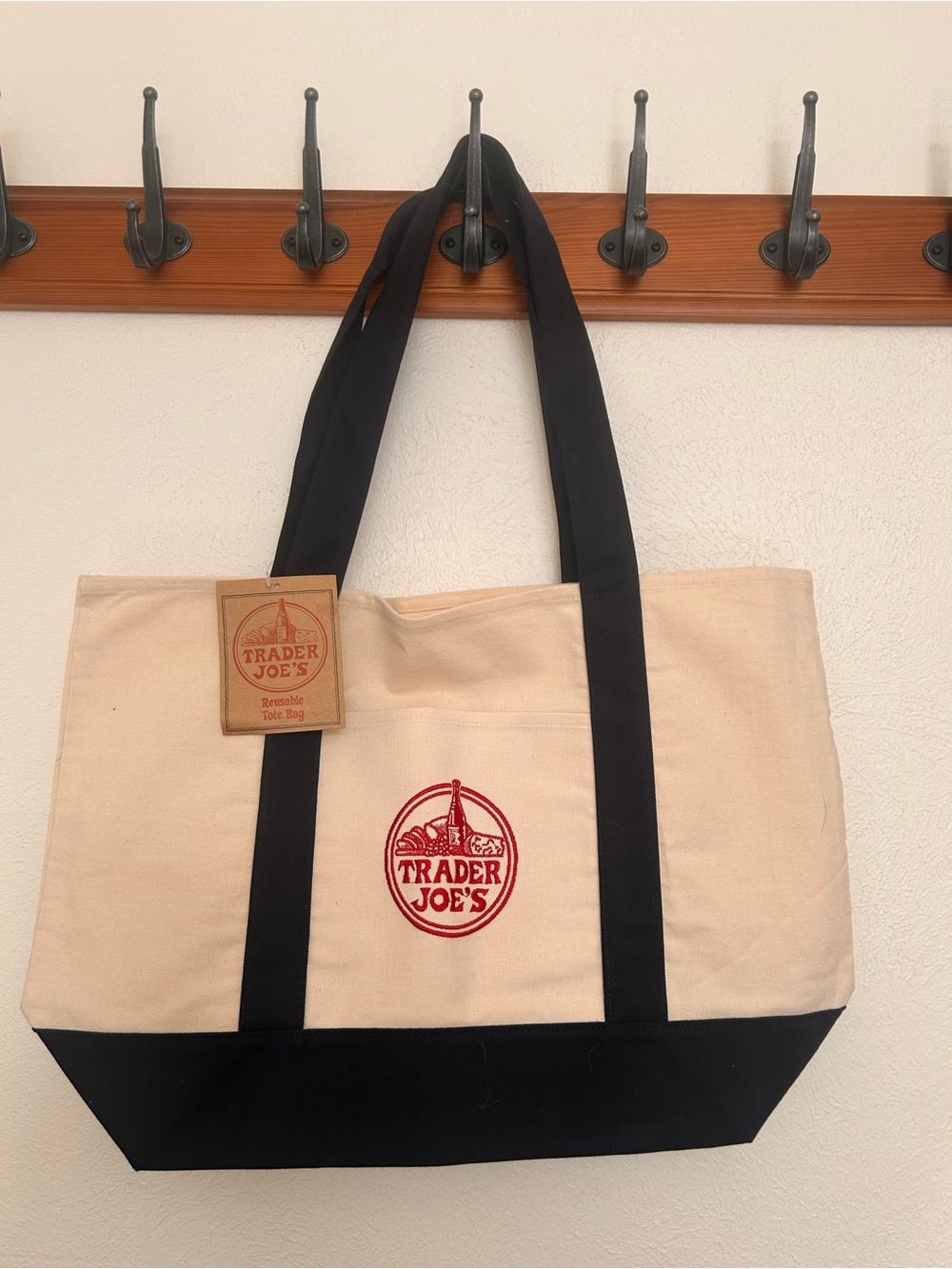Trader Joe’s Canvas Tote Bag with dark navy blue Trim.